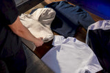 Close-up of left chest print areas on different garments