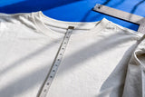 Measuring tape on t-shirt collar for print placement