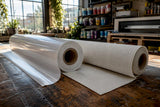 Close-up of vinyl and fabric banner materials side by side