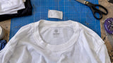Inside-out shirt with replacement neck label