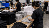 T-shirt bundles sorted into size groups